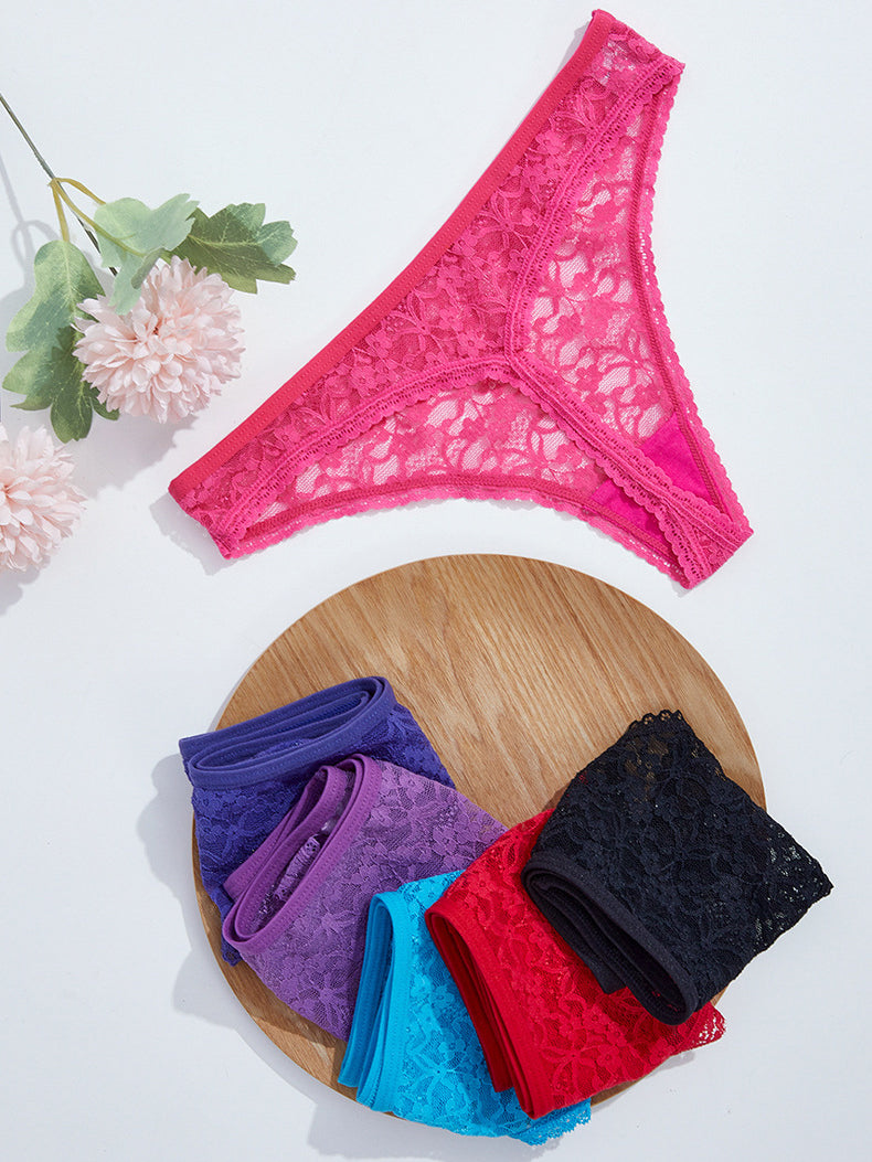 Colorful 5 Piezas Sexy Lace Seamless Breathable Mesh Thong Panties on display with flowers.